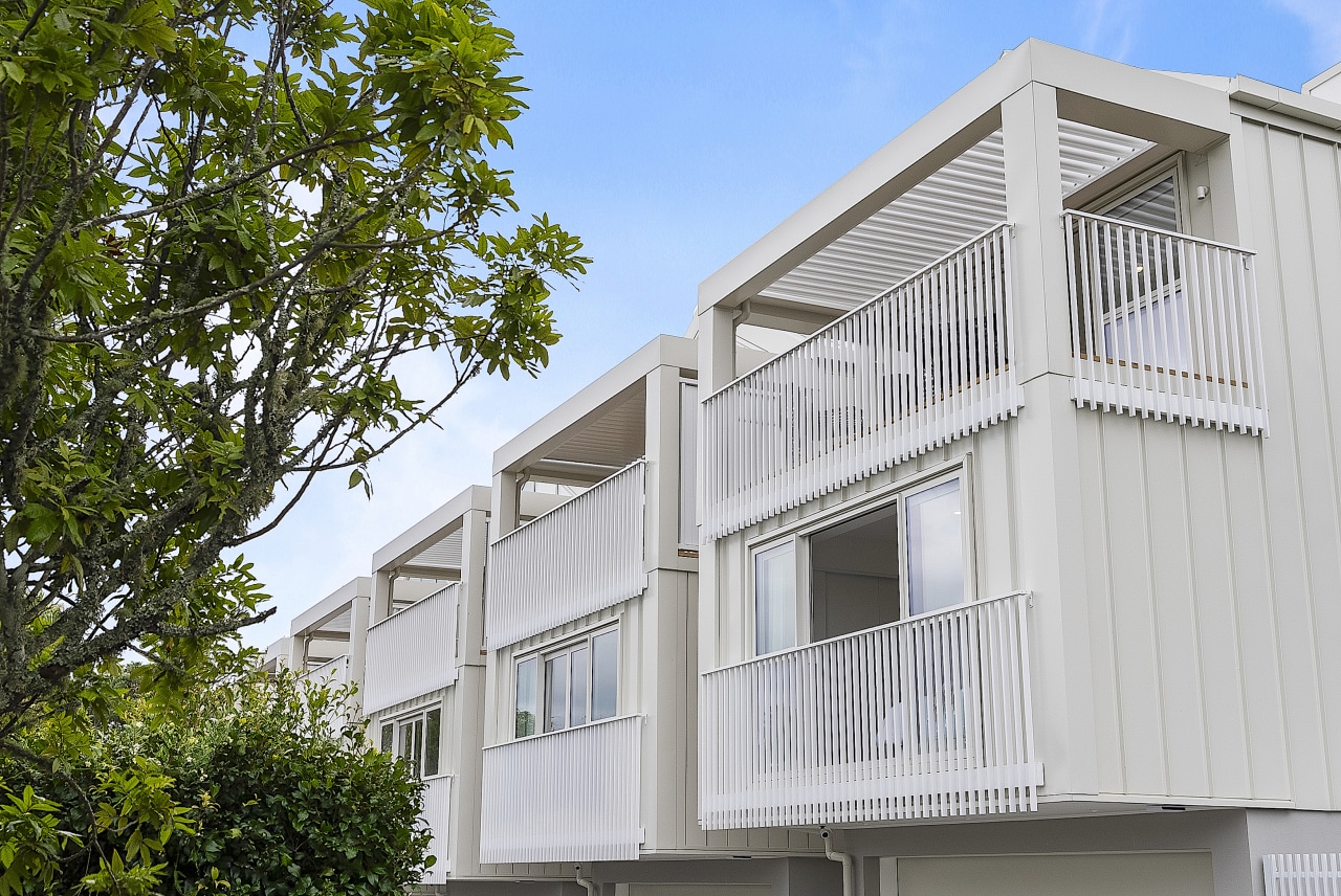 The tall yet understated exterior of the townhouses 