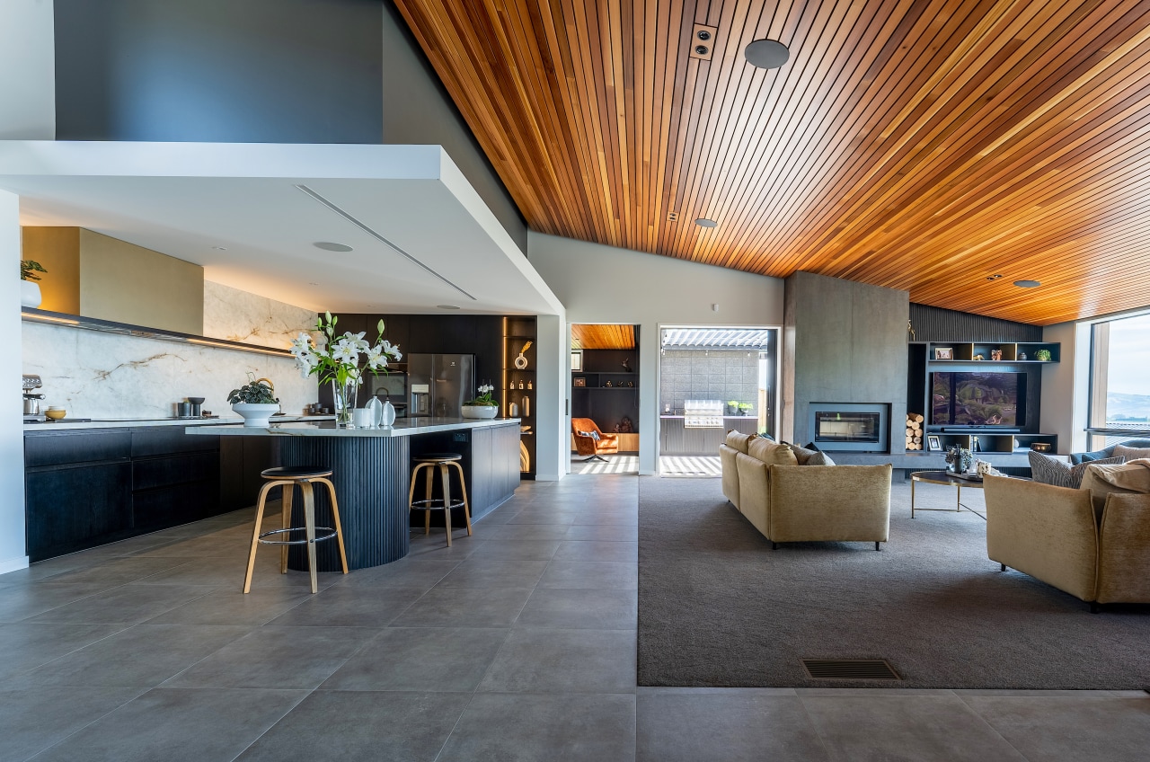 Living, kitchen with defining intimate ceiling, and dramatic 