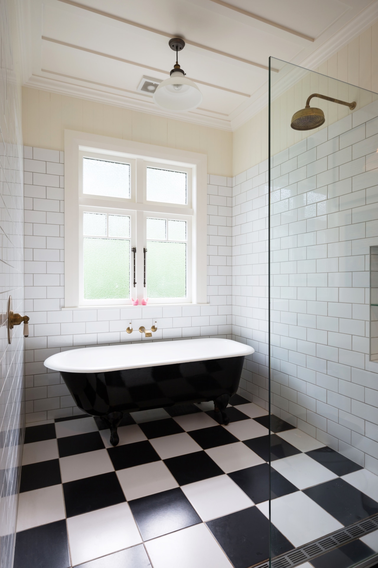 Black and white floor tiles create a strong architecture, bathroom, ceiling, daylighting, floor, flooring, home, interior design, plumbing fixture, room, tile, wall, gray, white
