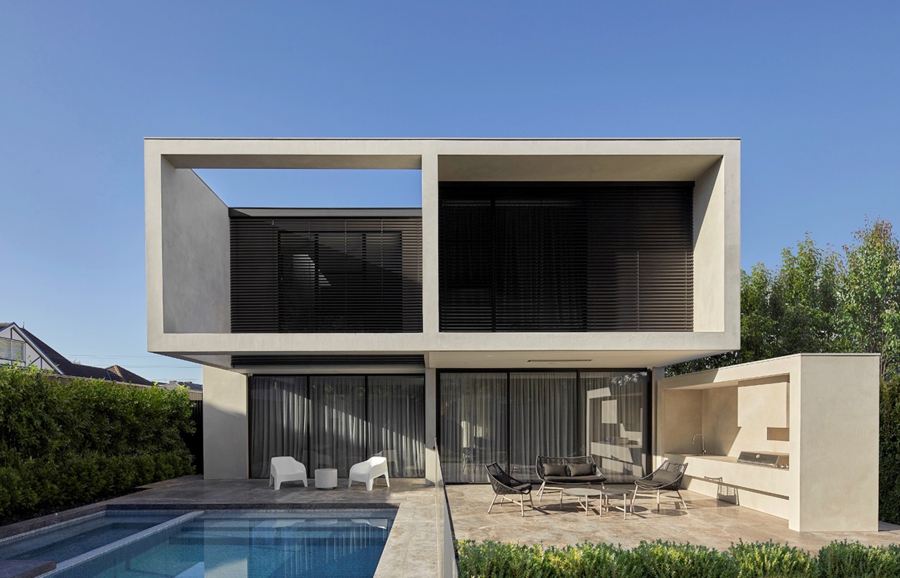 The clean-lined almost abstract/brutalist rear of home with 