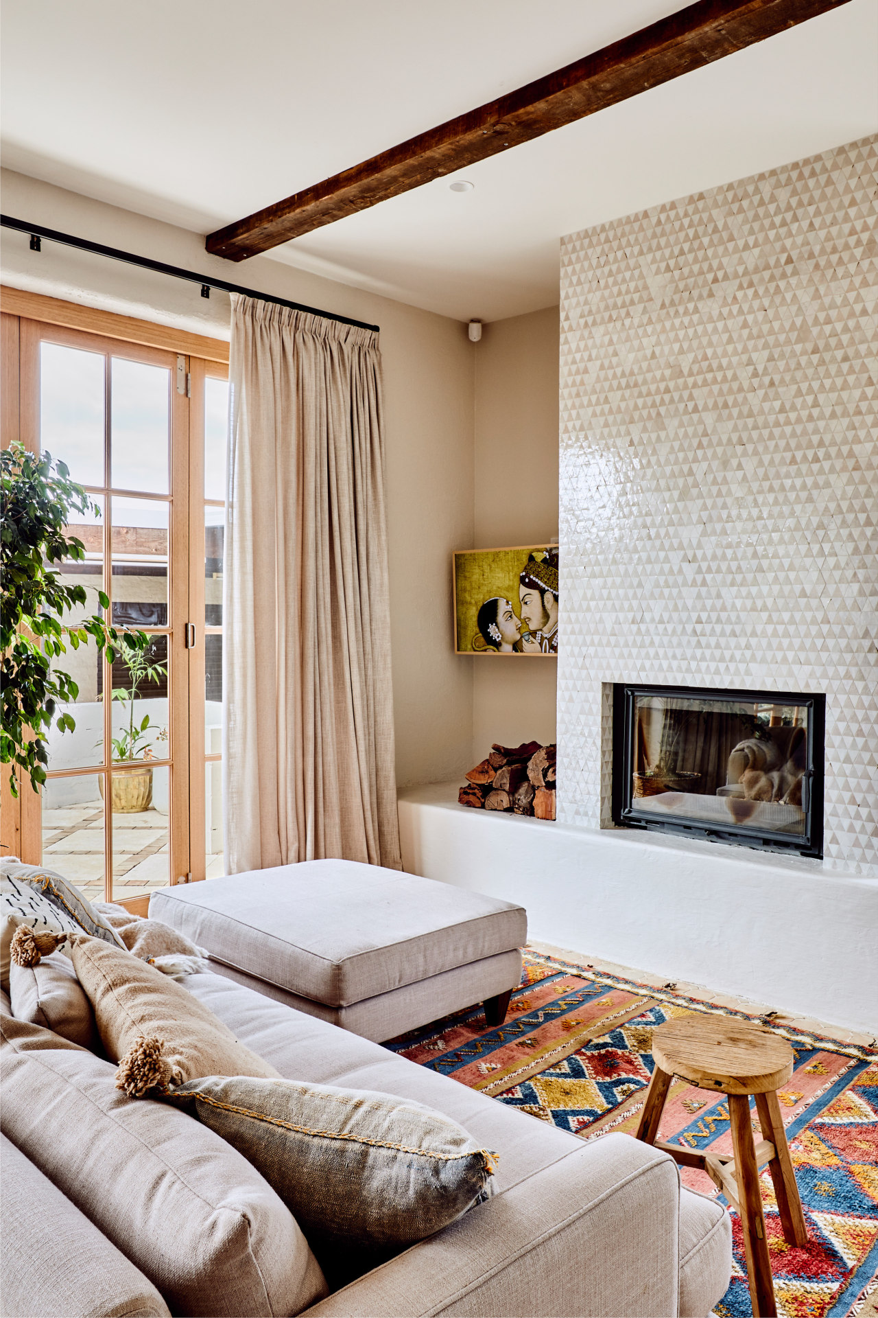 A feature tiled wall in the living area. 