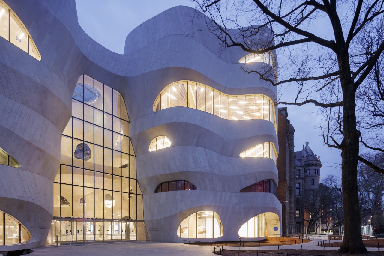 A high-performance facade with stone cladding, along with 