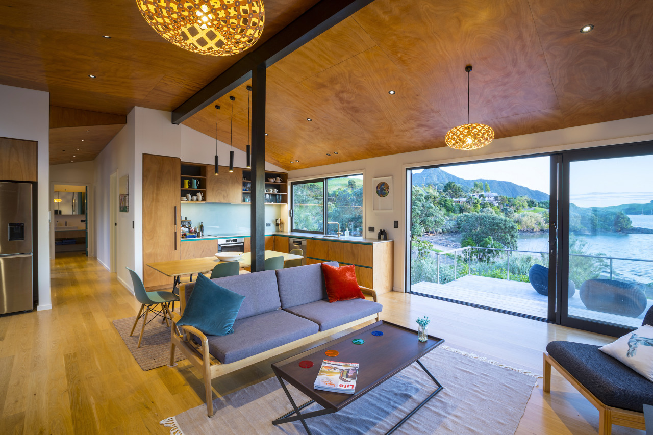 Looking across lounge space to kitchen and hall 