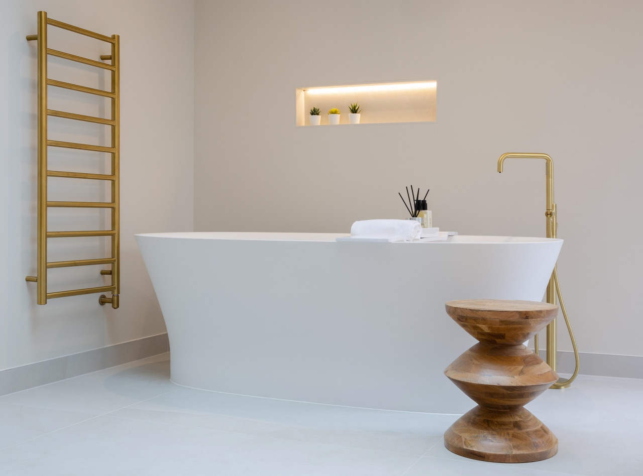 The freestanding tub with internally lit soap niche. 