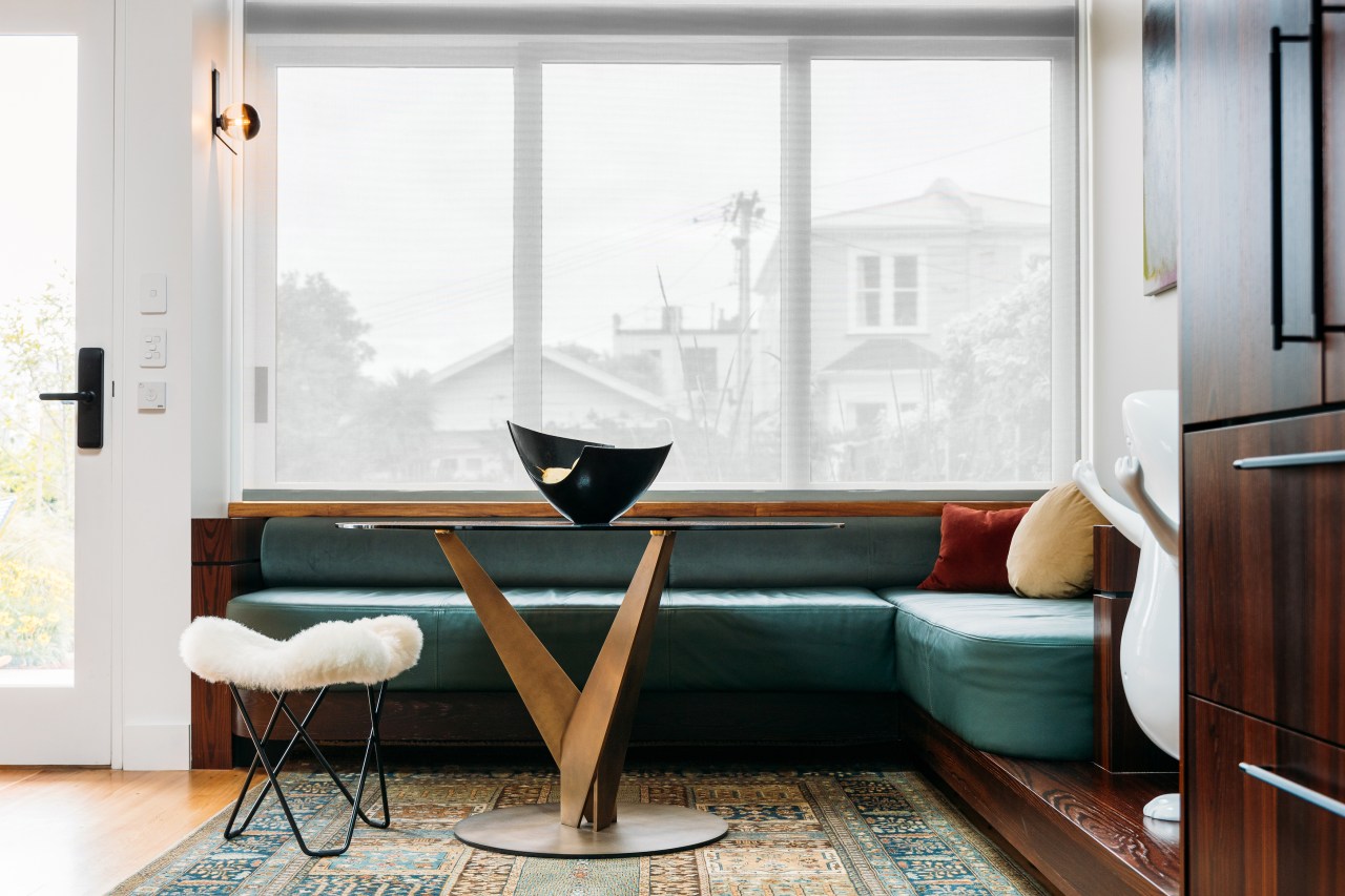Striking Mid-century furniture contributes to the rear extension's 