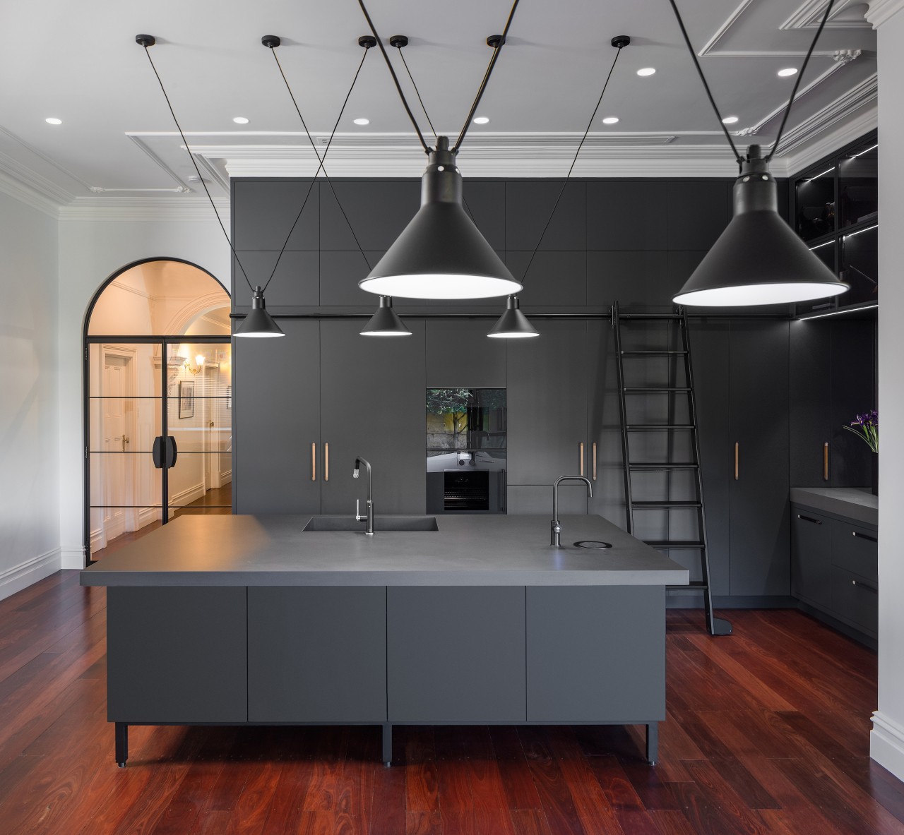 This contemporary, industrial kitchen renovation transformed the space 