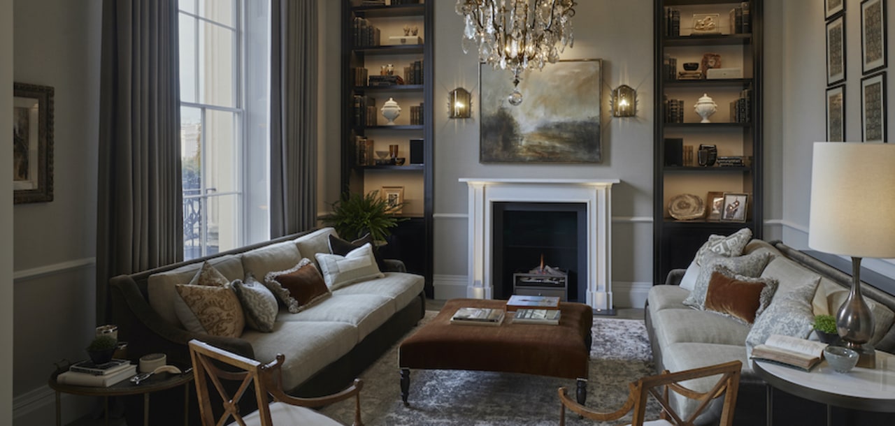 The drawing-room, overlooking the park, offers a warm 