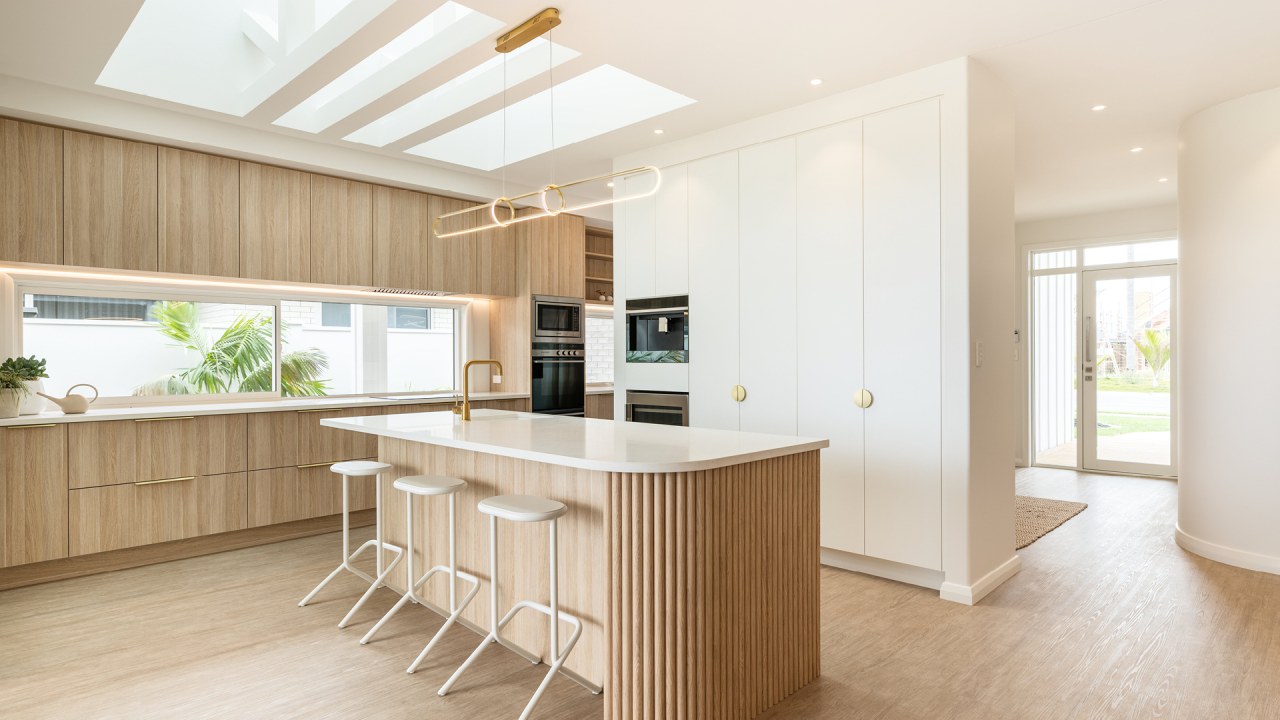 The showhome's designer kitchen is bathed in natural 