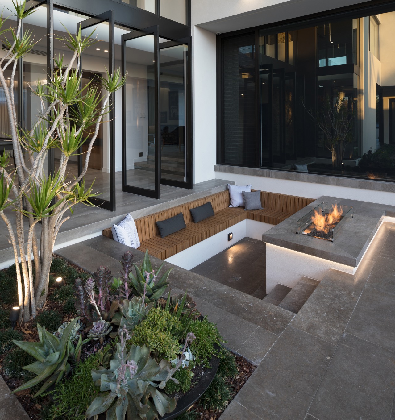 The conversation pit and fire are low set 