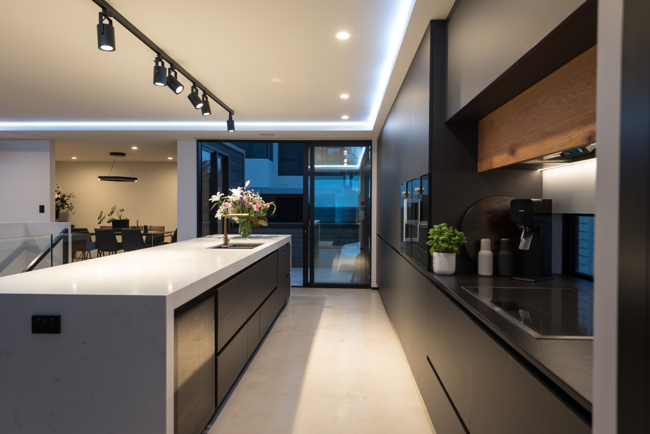 This kitchen is constrained by floor-to-ceiling glass doors architecture, countertop, benchtop, house, interior design, kitchen, black, di Rosa Cabinetry & Furniture