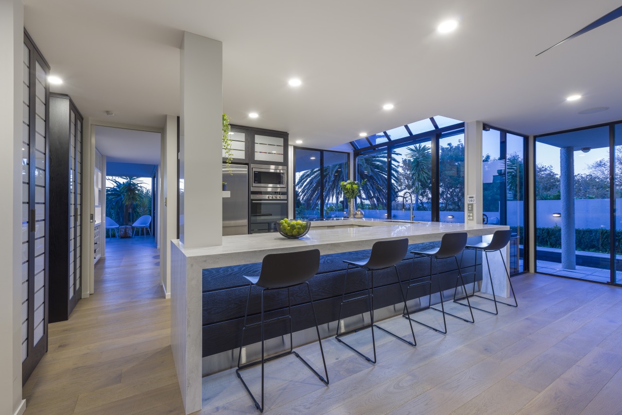 Crisp Corian benchtops play off the warm wood architecture, house, home, kitchen, fyfe Kitchens, Kira Gray, Corion, benchtop, kitchen renovation