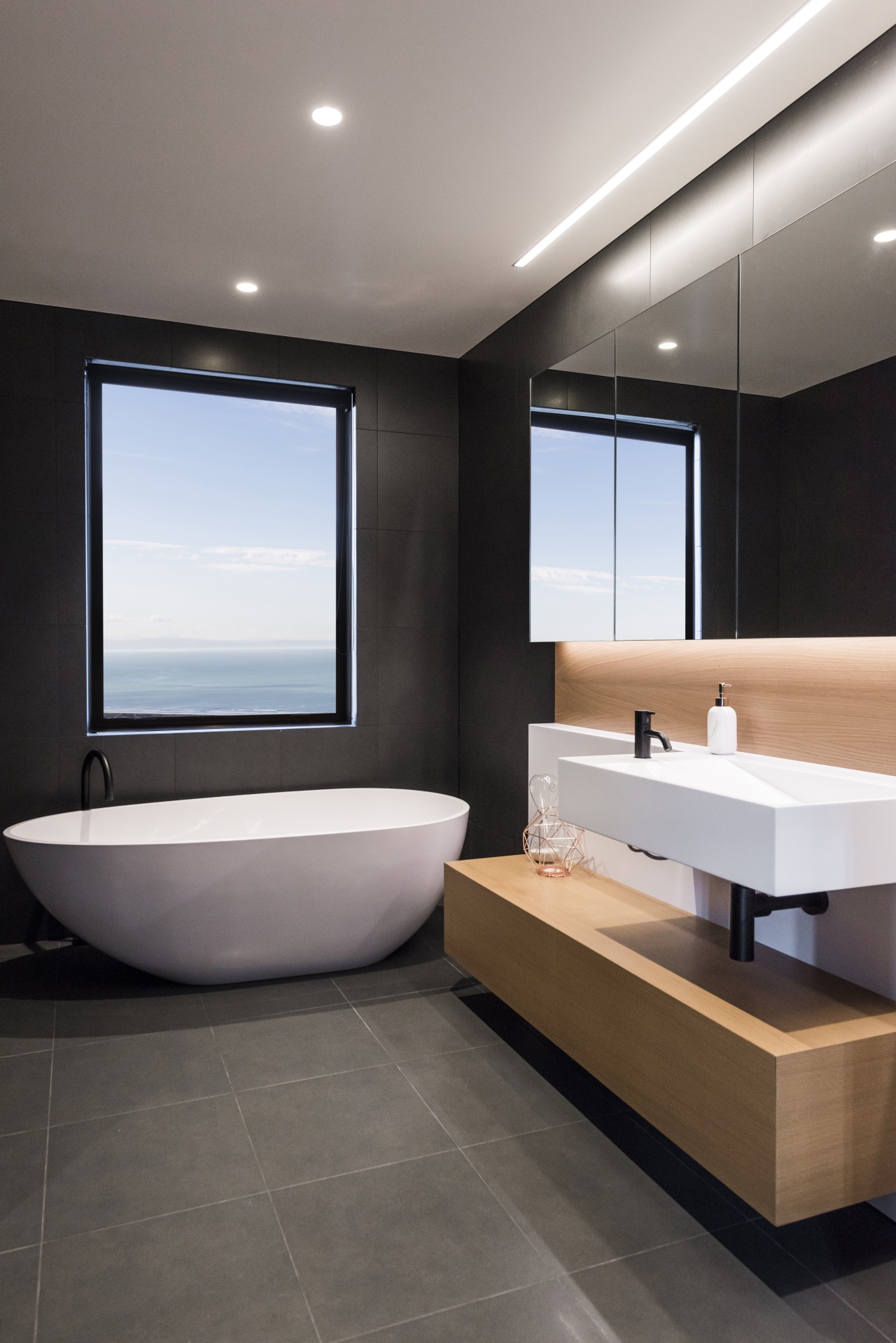 ​​​​​​​To achieve the effect you want in a bathroom, floor, tiles, interior design, sink, gray, black, freestanding bath, timber vanity top, Davinia Sutton