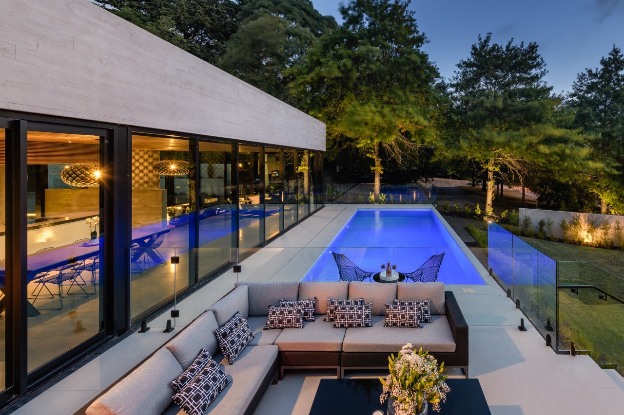 See more of the award-winning concrete home architecture, backyard, building, courtyard, design, estate, home, house, interior design, landscaping, leisure, lighting, patio, property, real estate, reflecting pool, residential area, roof, room, swimming pool, tree, villa, gray, black