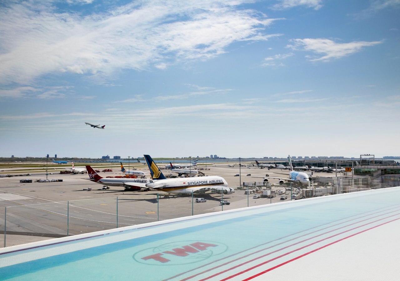 The TWA Hotel’s rooftop infinity pool and observation TWA Hotel rooftop pool,  observation deck, JFK runway 4