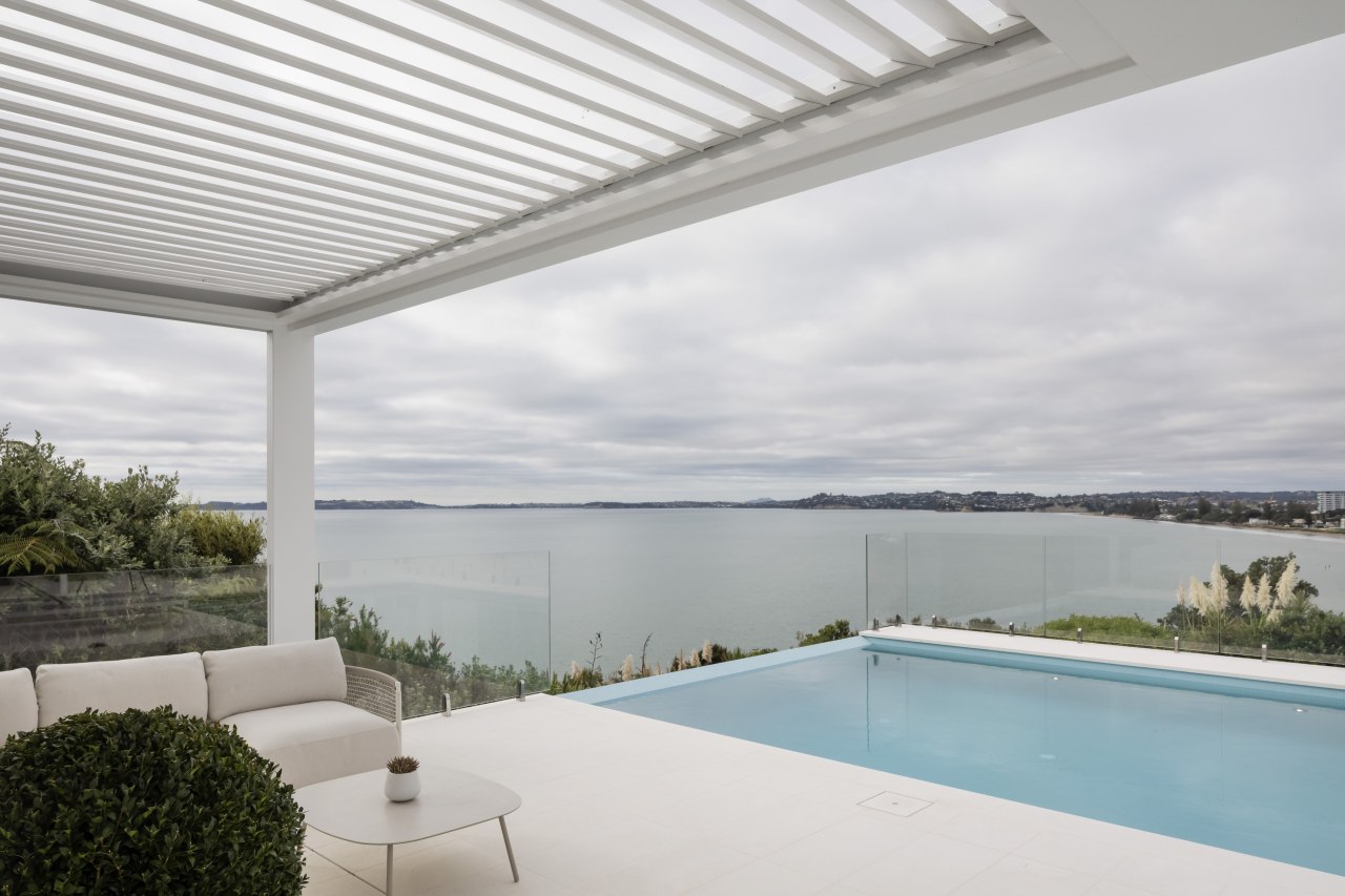 Operable louvres make the poolside cabana an all-weather 