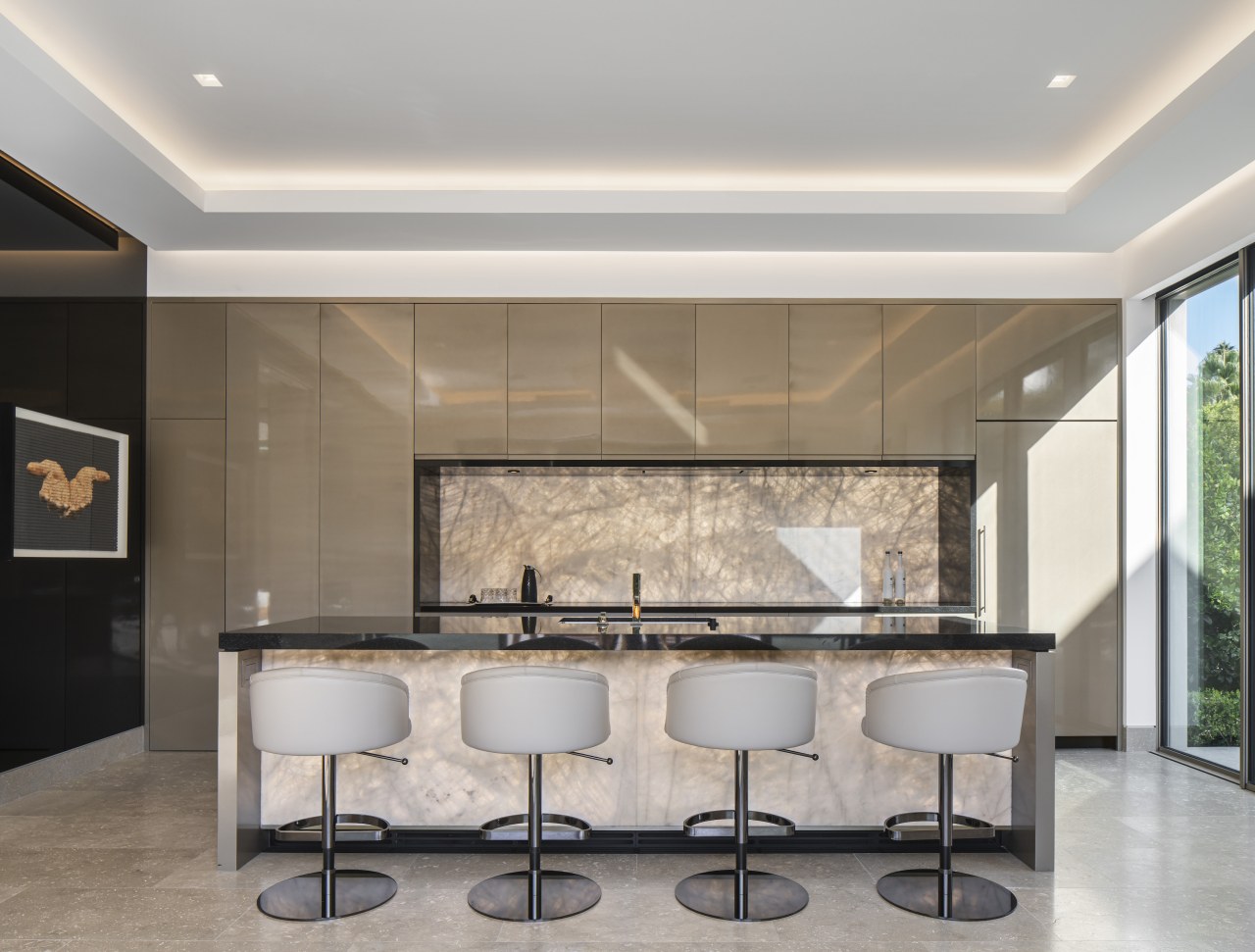 The kitchen shines with backlit pure white Crystalo 