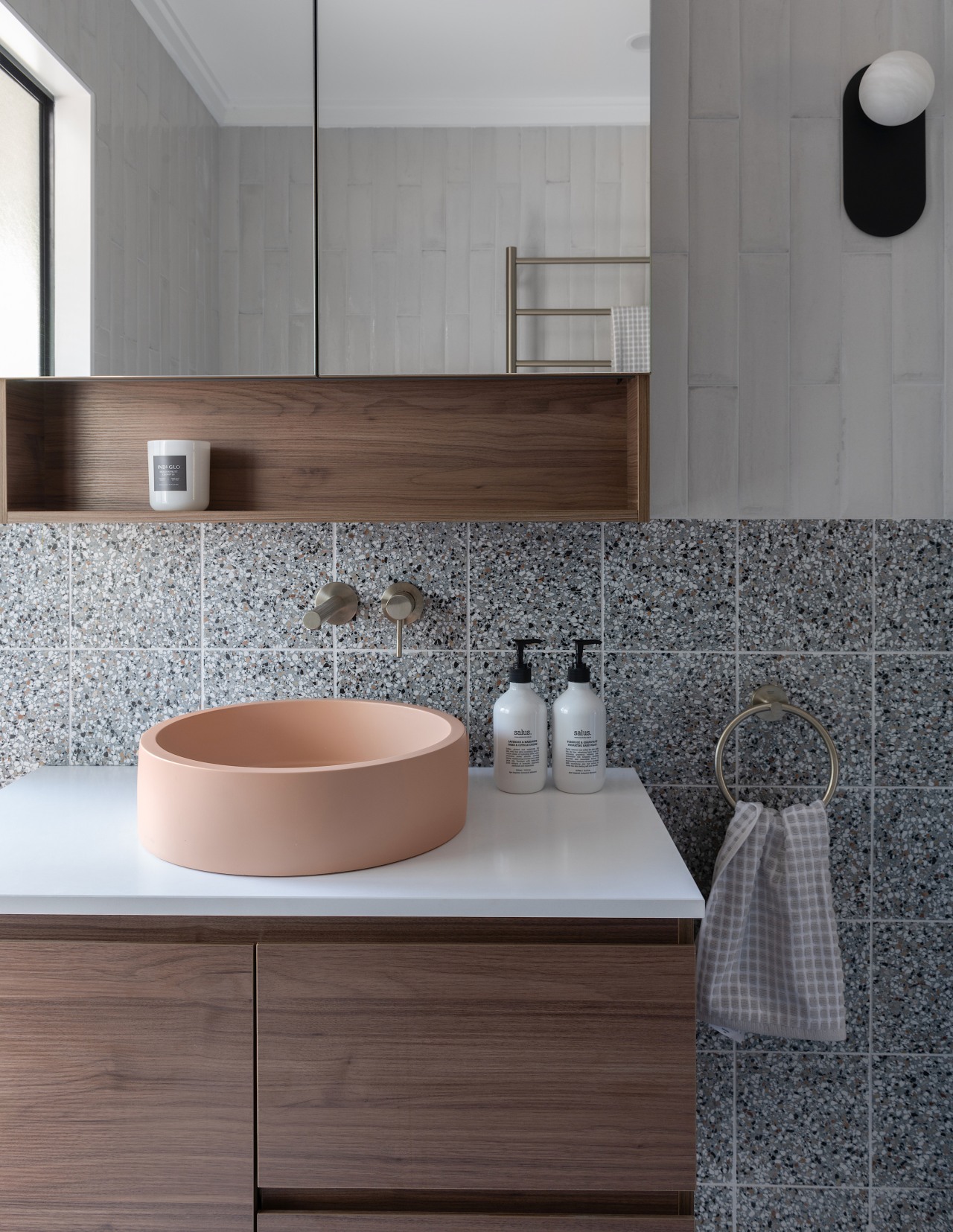 A Peach Nood basin features in the bathroom. 