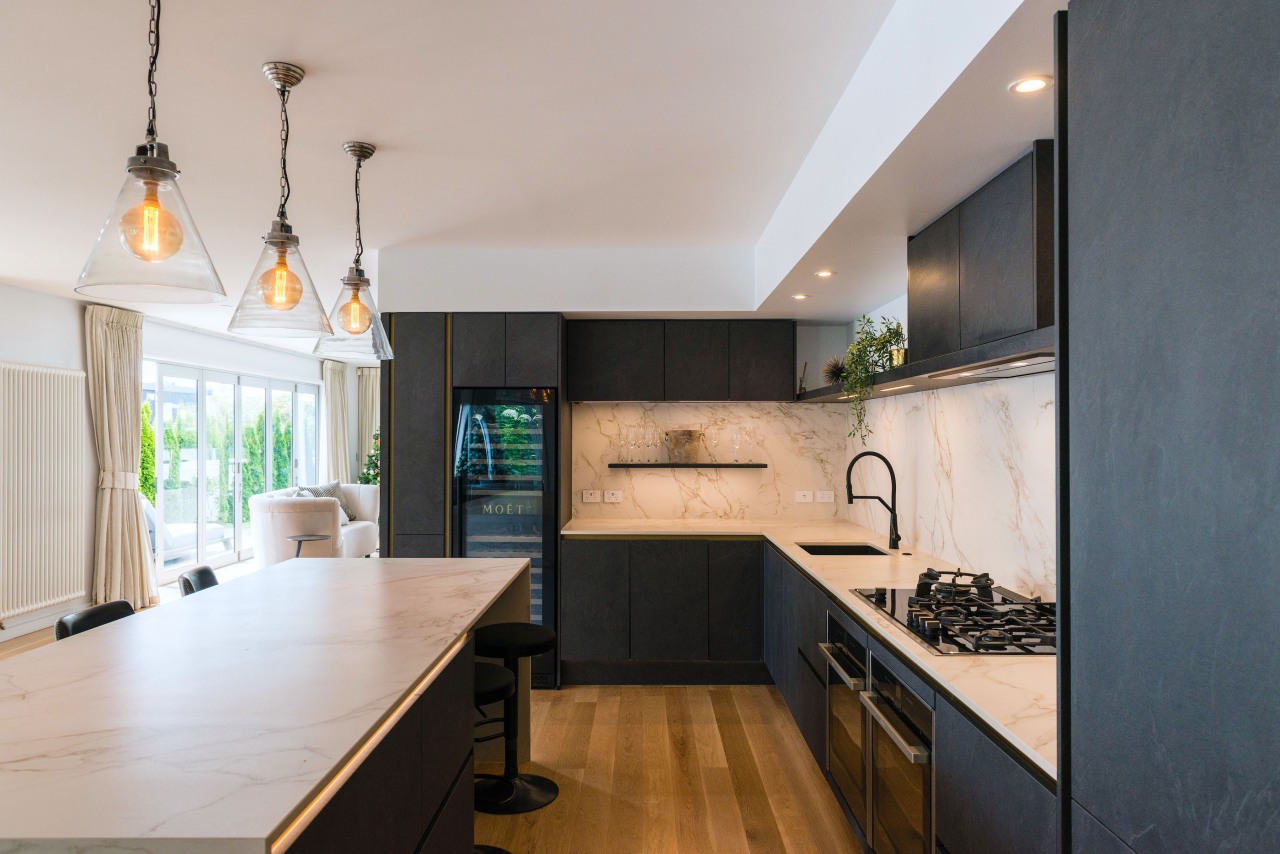 The kitchen boasts an L-shaped perimeter workspace. 