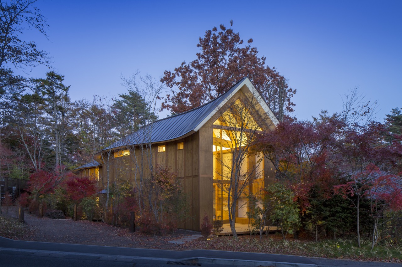 Shishi-Iwa House at dusk. architecture, autumn, barn, building, home, house, leaf, morning, plant, property, real estate, residential area, road, roof, rural area, shed, sky, sunlight, tree, blue, black