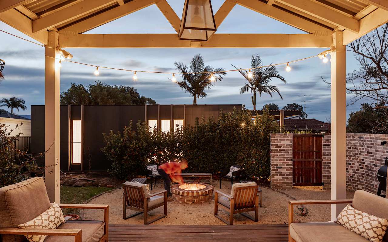 The studio's beautifully landscaped outdoor space achieves privacy 