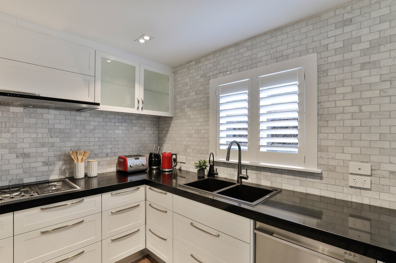 Extending the Stone Carrara Satin brick mosaics splashback 