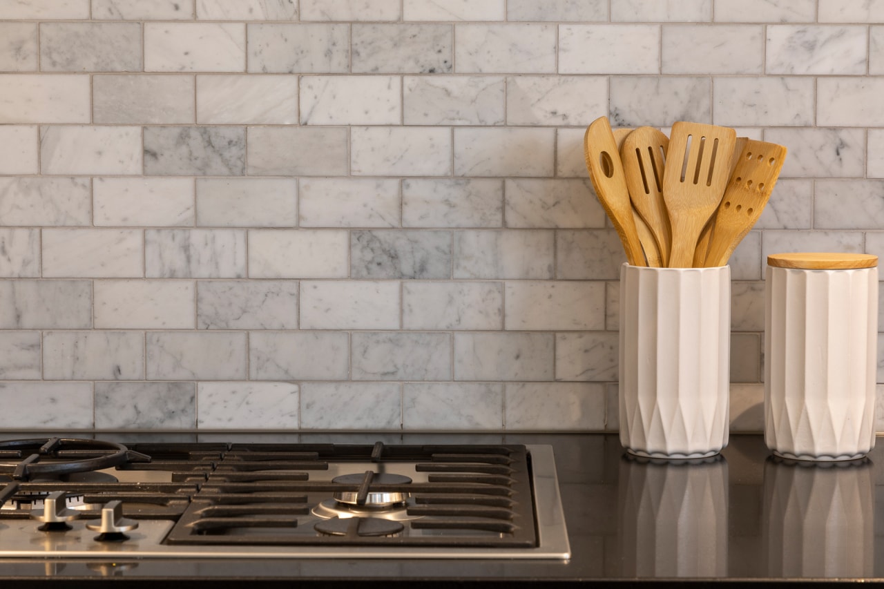 Stone Carrara Satin brick mosaics from The Tile 