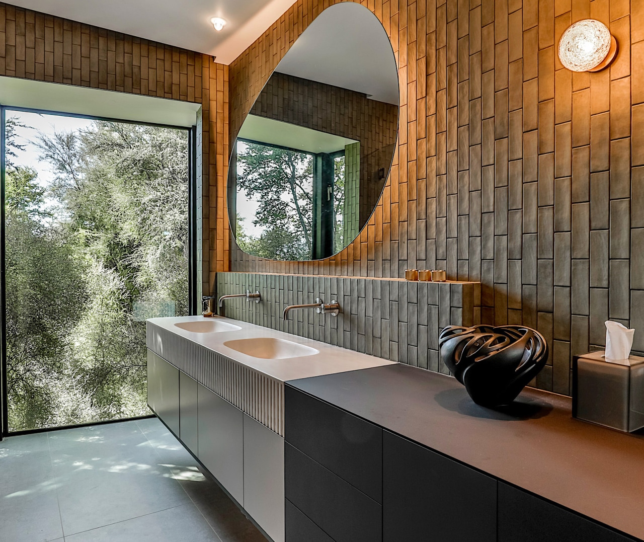 Spatially, a full-height picture window at the edge 