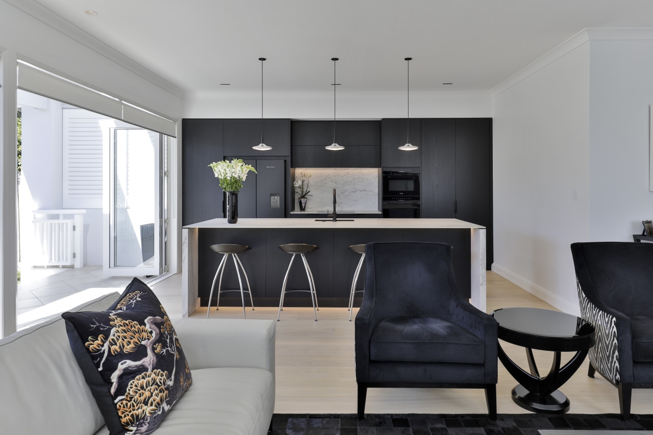 The existing Burr Elm Kitchen cabinetry including black 