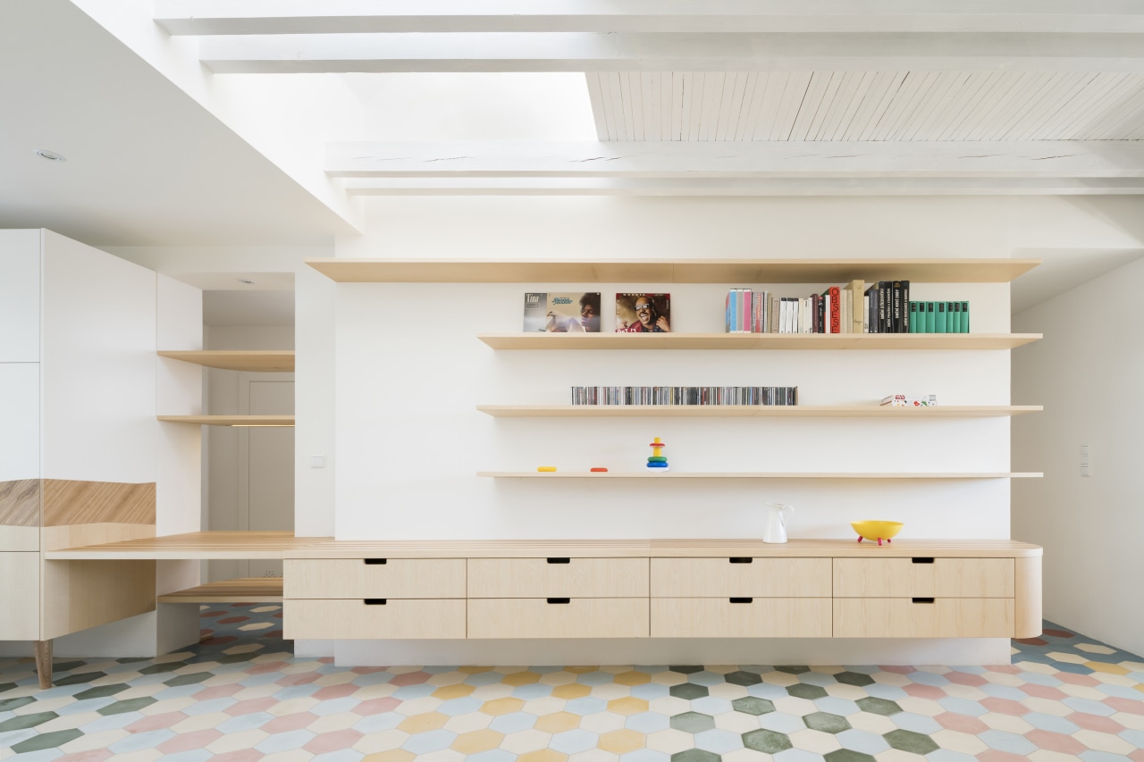 Third floor living space with distinctive flooring. 