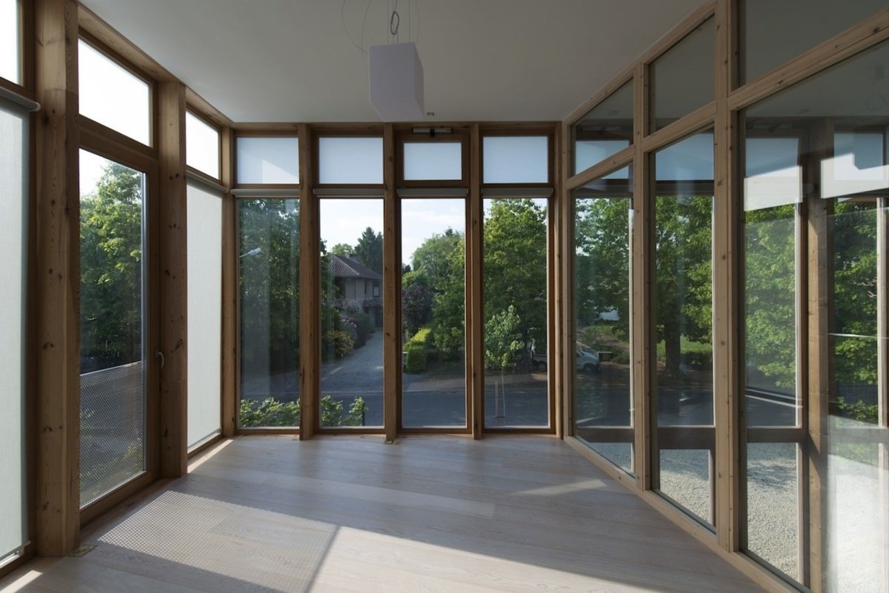 The windows frame the garden architecture, daylighting, door, house, porch, property, real estate, window, gray, black