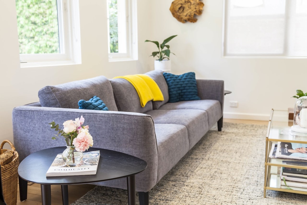 A closer view of the interior decoration couch, floor, furniture, home, interior design, living room, room, sofa bed, table, white