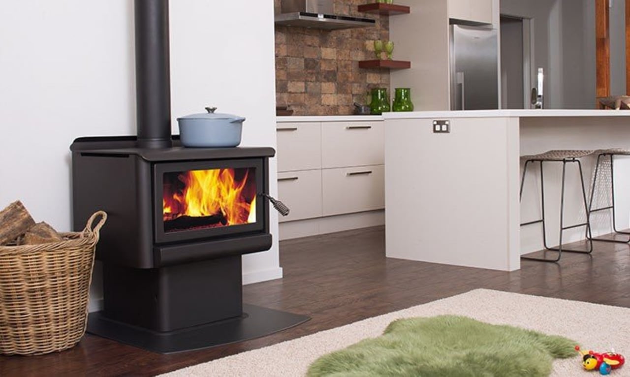 It’s better to run a smaller appliance harder fireplace, hearth, heat, home appliance, major appliance, product, product design, stove, wood burning stove, gray