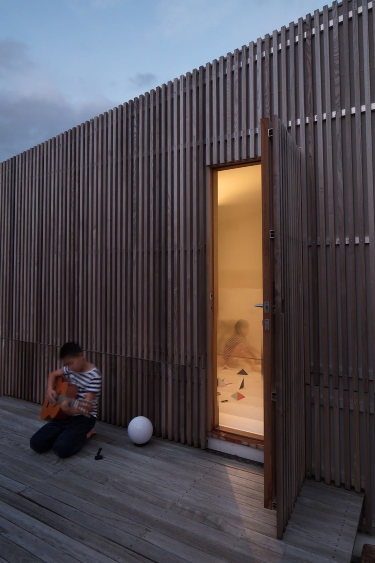 Don't let the outside appearance fool you – architecture, building, facade, home, house, wall, wood, black