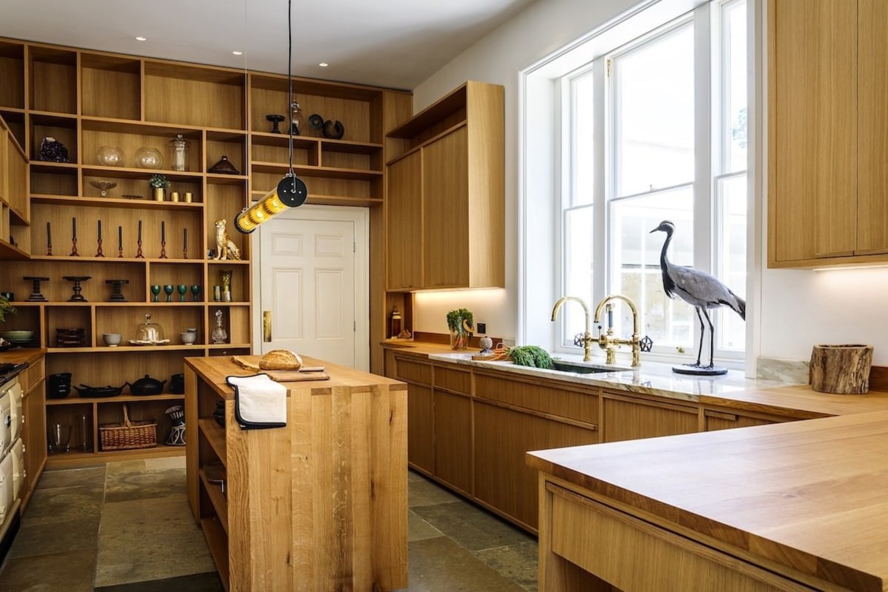 Wood benchtops add warmth to a kitchen. Their cabinetry, countertop, cuisine classique, interior design, kitchen, wood, brown, white