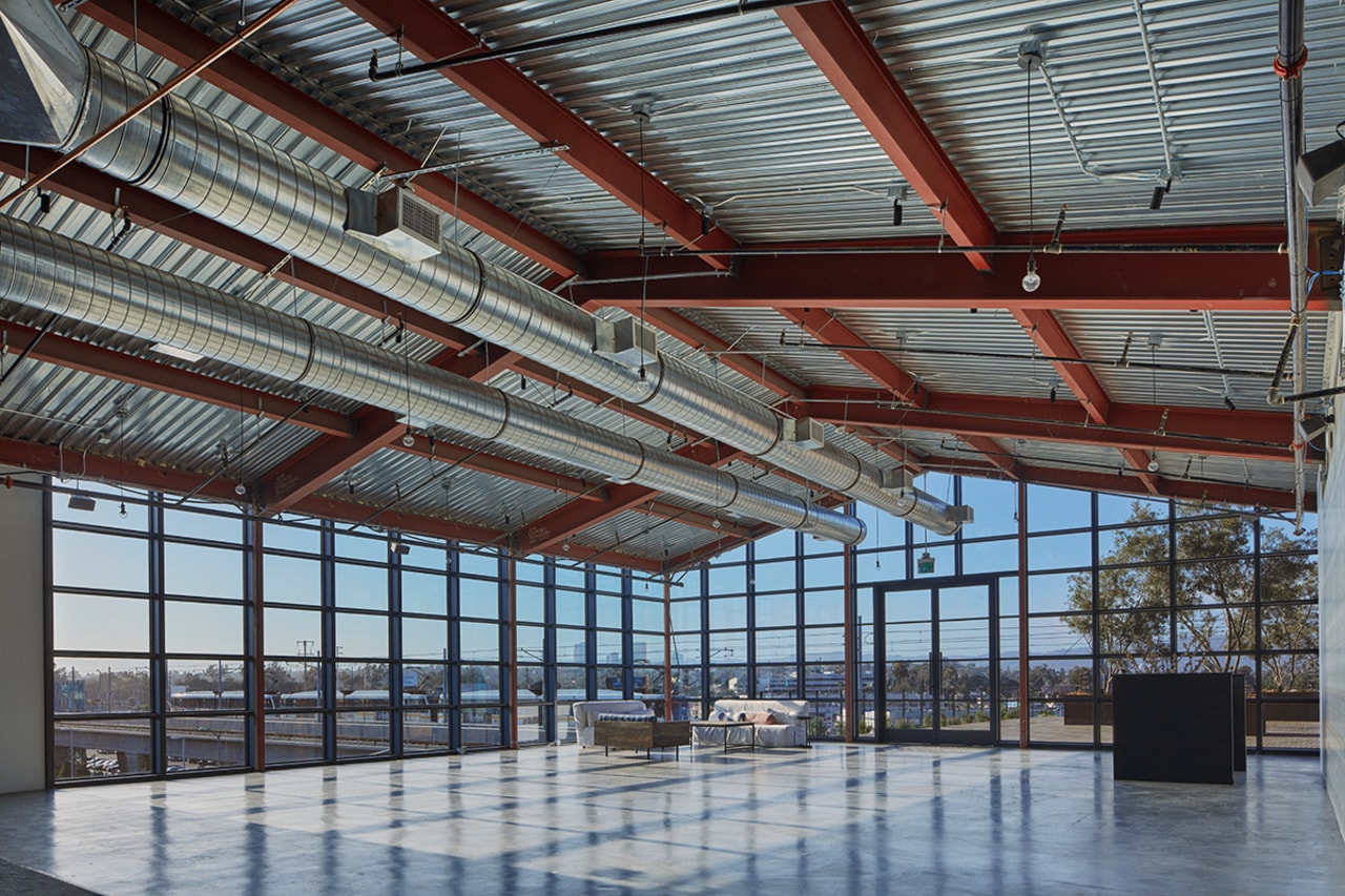 The Greenhouse restaurant and event space continues the beam, daylighting, roof, steel, structure, gray