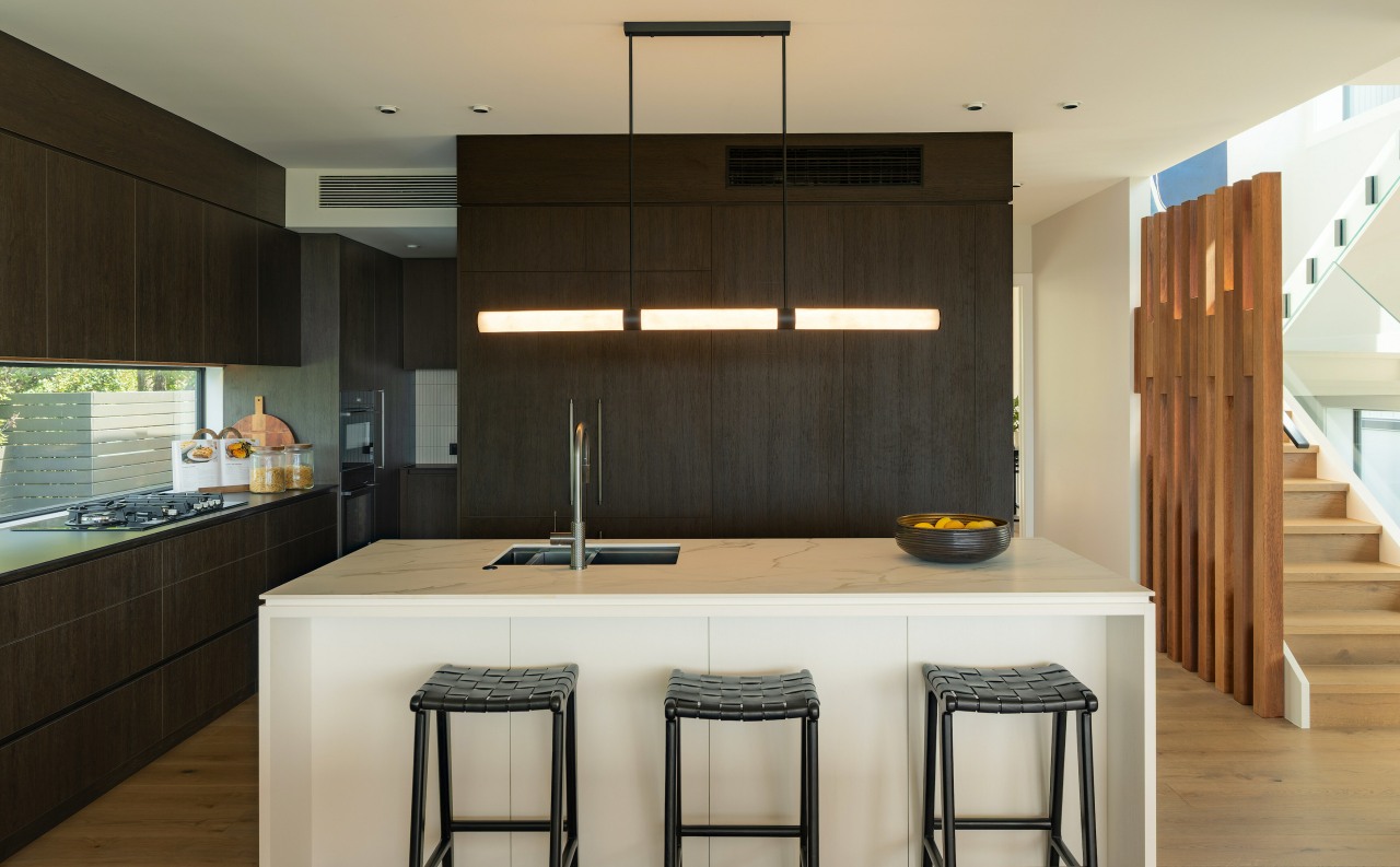 The two-tone kitchen approach was carefully considered to 
