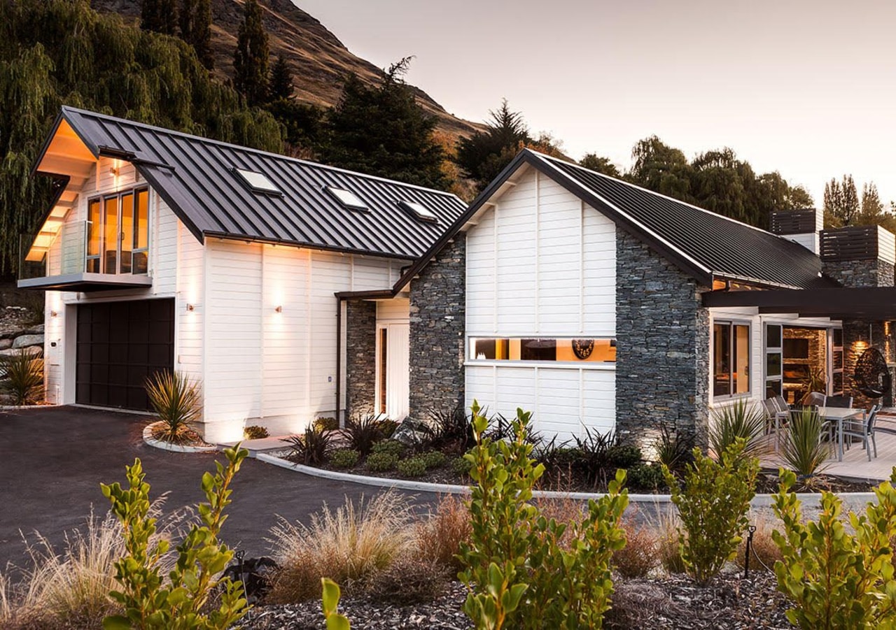 Natural schist and timber weatherboards on Queenstown home cottage, estate, farmhouse, home, house, property, real estate, residential area, roof, siding, window, white, brown, black