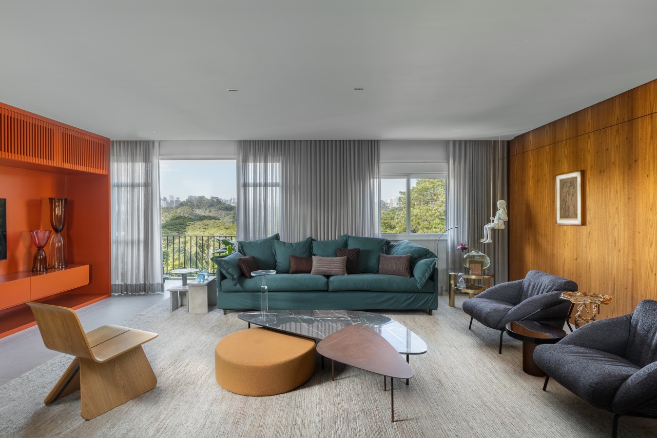 Living room with organising wood wall at right. 