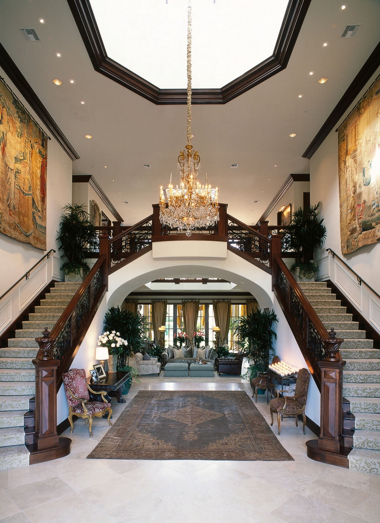 entranceway to house including atrium and dual staircase ceiling, estate, interior design, lobby, stairs, gray, white