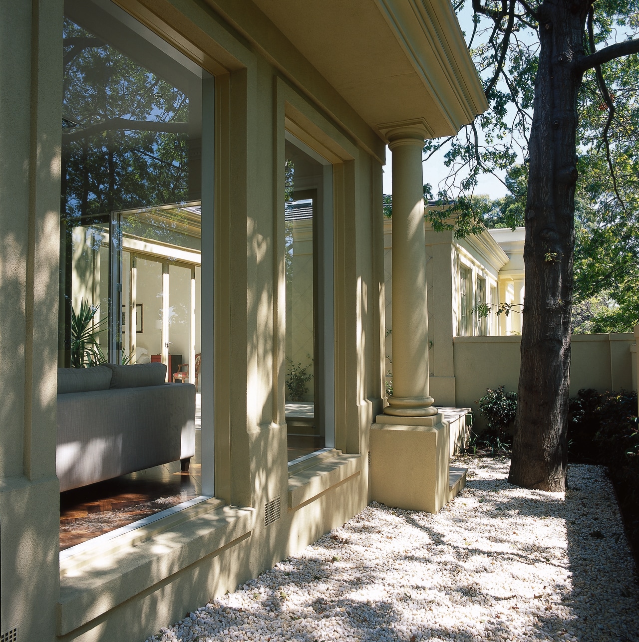 Columns and architraves of townhouse home, house, outdoor structure, porch, real estate, siding, structure, window, brown, black