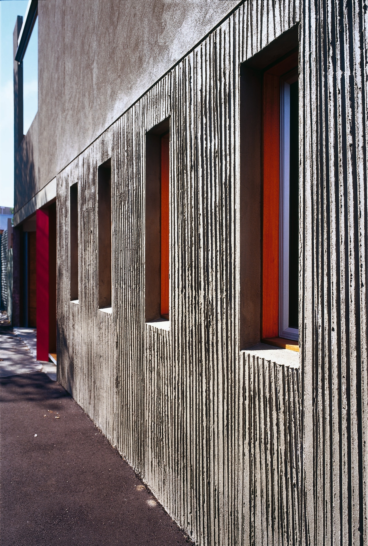 The view of the side of a home architecture, building, door, facade, house, siding, structure, wall, window, wood, black, white