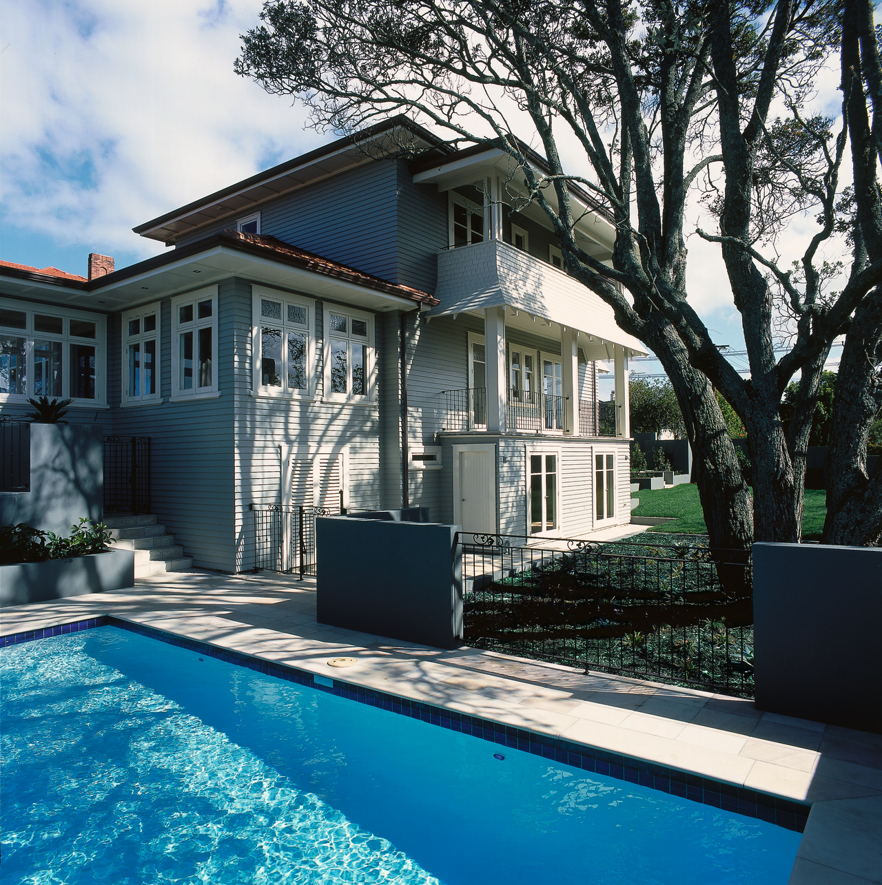 Pool area in front of weatherboard house, with architecture, backyard, building, cottage, estate, facade, home, house, mansion, property, real estate, residential area, siding, swimming pool, villa, window, black