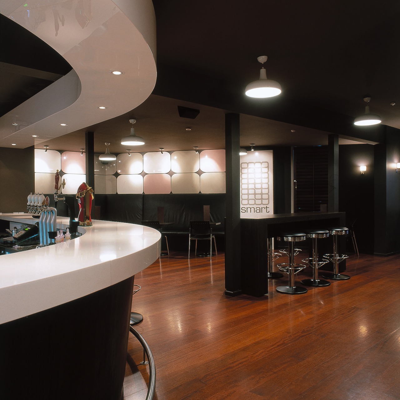 Bar interior with extensive timber flooring shown ceiling, countertop, floor, flooring, hardwood, interior design, kitchen, restaurant, table, wood, wood flooring, black, brown