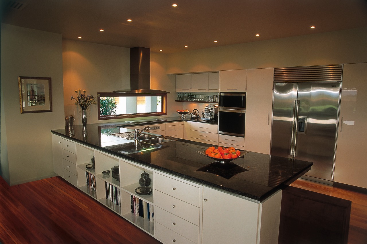 An example of a kitchen designed, manufactured and cabinetry, countertop, interior design, kitchen, room, brown