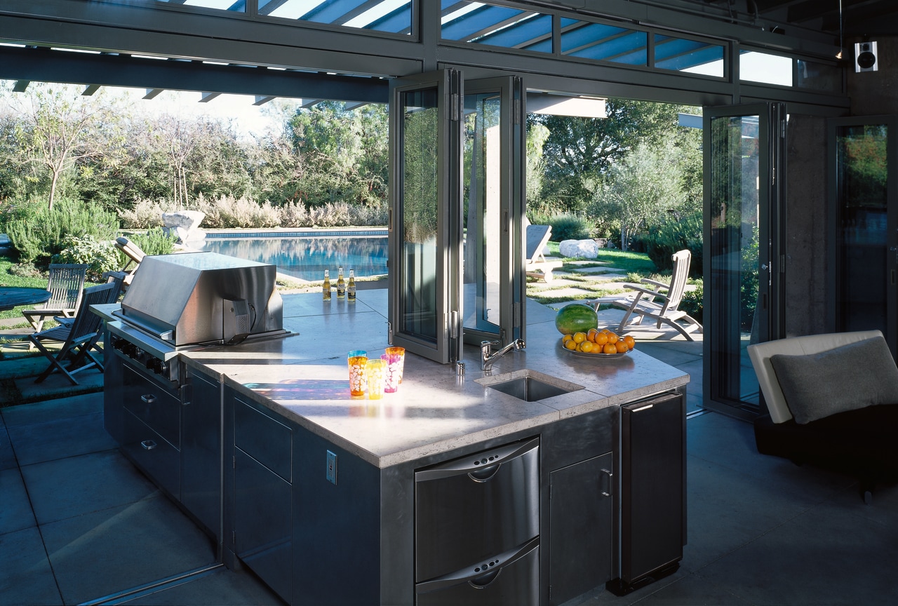 View of the kitchen area with indoor/outdoor flow outdoor structure, real estate, window, black