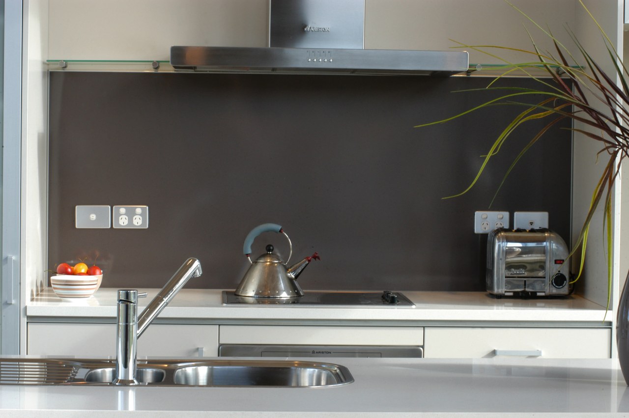 Kitchen with light grey cabinetry, white benchtop, and countertop, furniture, kitchen, black, gray