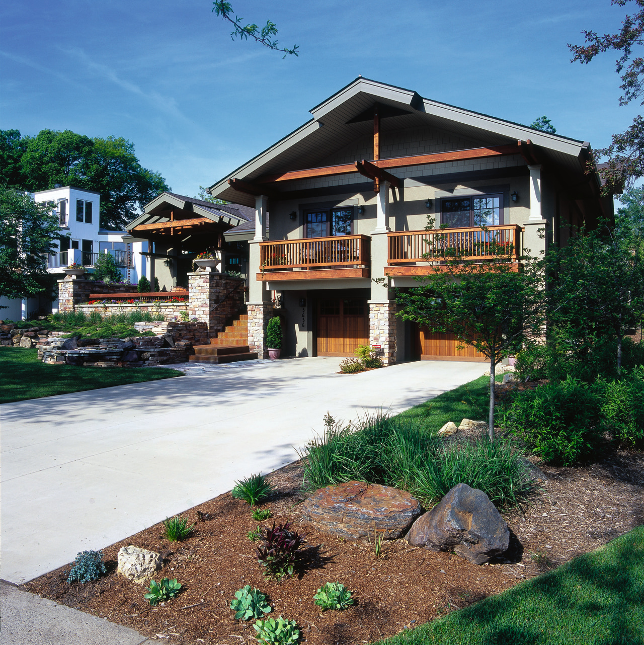 Exterior view of the entrance of the home, cottage, estate, home, house, landscaping, outdoor structure, plant, real estate, residential area, black