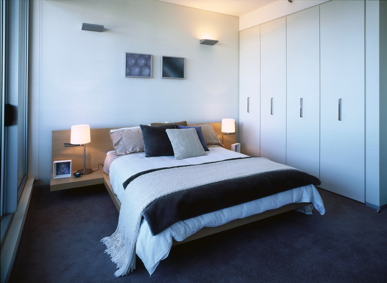 Bedroom with neutral coloured painted walls, and wardrobe bed, bed frame, bedroom, ceiling, floor, home, interior design, property, real estate, room, suite, wall, white