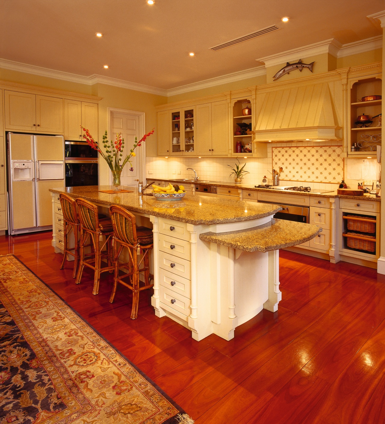 View of the kitchen area cabinetry, countertop, cuisine classique, floor, flooring, furniture, hardwood, interior design, kitchen, laminate flooring, room, wood, wood flooring, orange, red