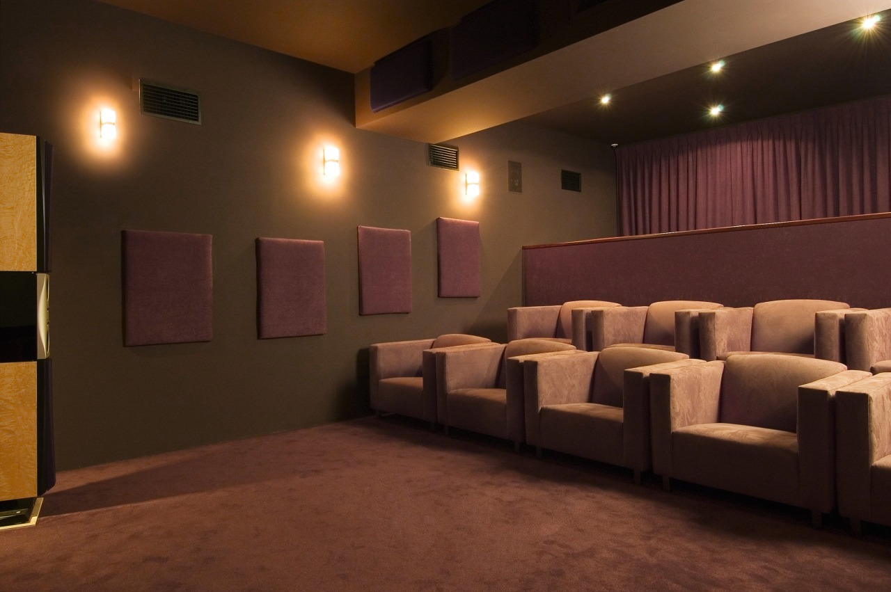 Interior view of home theatre room with large auditorium, ceiling, floor, flooring, function hall, interior design, lighting, room, theatre, wall, brown